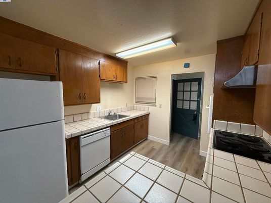 Interior, Kitchen, Tile Countertops, Wood Texture Flooring