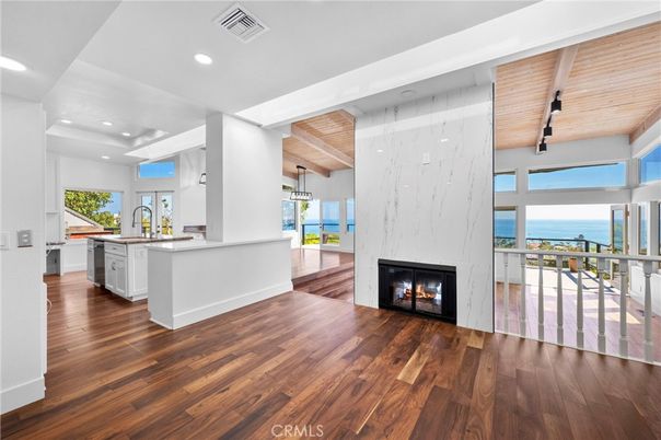 Fireplace, Interior, Kitchen, Marble Walls, Pendant Lights, Recessed Lighting, Water, Wooden Beams, Wooden Ceilings, Wood Texture Flooring