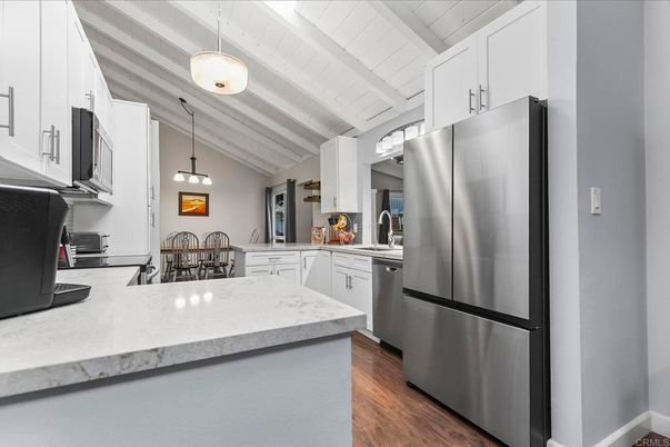 Dining room, Interior, Kitchen, Pendant Lights, Stainless Steel Appliances, Wood Texture Flooring