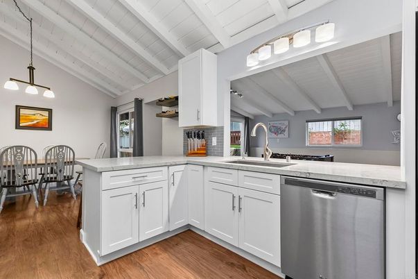 Dining room, Interior, Kitchen, Pendant Lights, Stainless Steel Appliances, Wood Texture Flooring