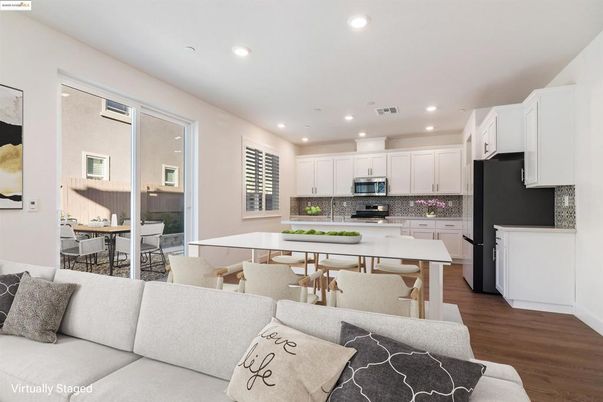 Dining room, Interior, Kitchen, Living room, Recessed Lighting, Stainless Steel Appliances, Wood Texture Flooring