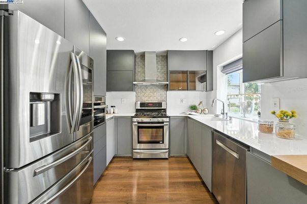 Interior, Kitchen, Recessed Lighting, Stainless Steel Appliances, Wood Texture Flooring