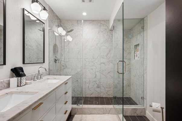 Bathroom, Dual Sink Vanities, Glass Shower, Interior, Marble Walls, Recessed Lighting