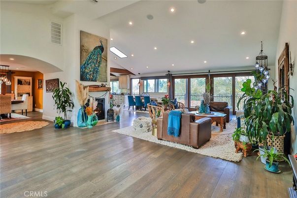 Dining room, Fireplace, Interior, Living room, Pendant Lights, Recessed Lighting, Wood Texture Flooring