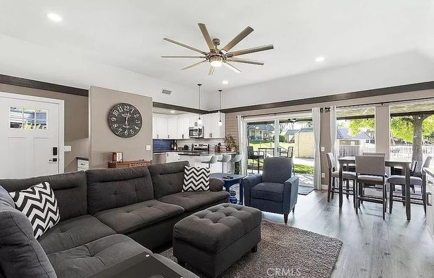 Dining room, Interior, Kitchen, Living room, Pendant Lights, Recessed Lighting, Stainless Steel Appliances, Wood Texture Flooring