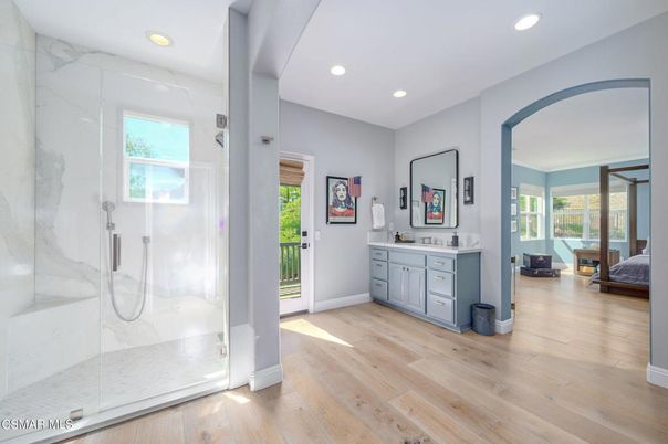Bathroom, Glass Shower, Interior, Marble Walls, Recessed Lighting, Wood Texture Flooring