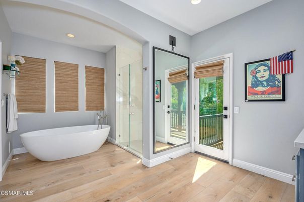 Bathroom, Free Standing Baths, Glass Shower, Interior, Recessed Lighting, Wood Texture Flooring