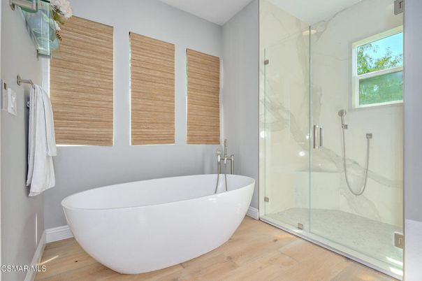 Bathroom, Free Standing Baths, Glass Shower, Interior, Marble Walls, Wood Texture Flooring