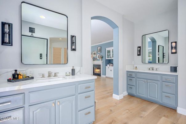 Bathroom, Dual Sink Vanities, Fireplace, Interior, Recessed Lighting, Wood Texture Flooring
