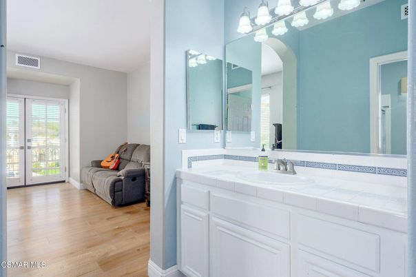 Bathroom, Dual Sink Vanities, Interior, Tile Countertops, Wood Texture Flooring