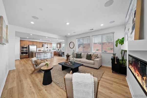 Fireplace, Interior, Kitchen, Living room, Recessed Lighting, Stainless Steel Appliances, Wood Texture Flooring