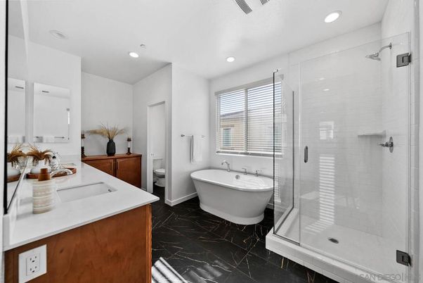 Bathroom, Dual Sink Vanities, Free Standing Baths, Glass Shower, Interior, Marble, Recessed Lighting