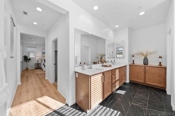 Bathroom, Dual Sink Vanities, Interior, Marble, Recessed Lighting, Wood Texture Flooring