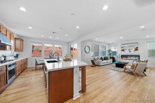 Dining room, Fireplace, Interior, Kitchen, Living room, Recessed Lighting, Wood Texture Flooring