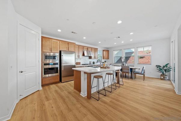 Dining room, Interior, Kitchen, Recessed Lighting, Stainless Steel Appliances, Wood Texture Flooring