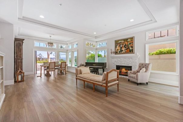 Dining room, Fireplace, Interior, Living room, Pendant Lights, Recessed Lighting, Wood Texture Flooring