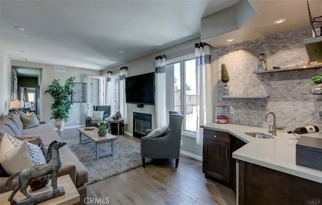 Fireplace, Interior, Kitchen, Living room, Recessed Lighting, Stone Walls, Wood Texture Flooring