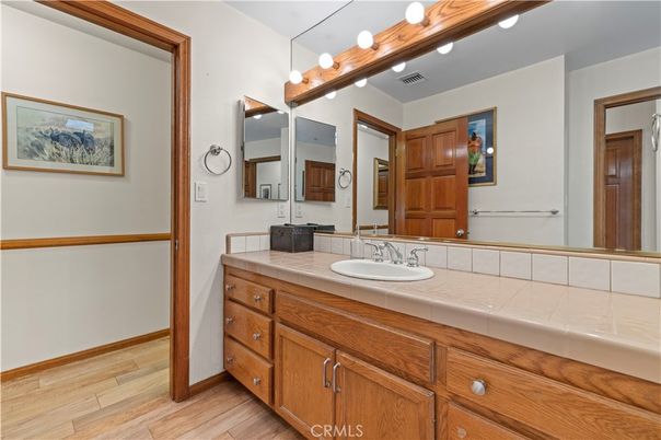 Bathroom, Dual Sink Vanities, Interior, Tile Countertops, Wood Texture Flooring