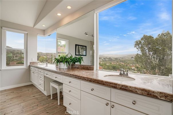 Bathroom, Dual Sink Vanities, Interior, Recessed Lighting, Wood Texture Flooring