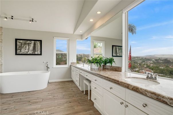Bathroom, Dual Sink Vanities, Free Standing Baths, Interior, Recessed Lighting, Wood Texture Flooring