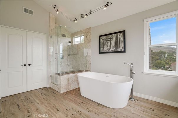 Bathroom, Free Standing Baths, Glass Shower, Interior, Marble Walls, Wood Texture Flooring