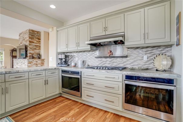 Interior, Kitchen, Recessed Lighting, Stainless Steel Appliances, Stone Walls, Wood Texture Flooring