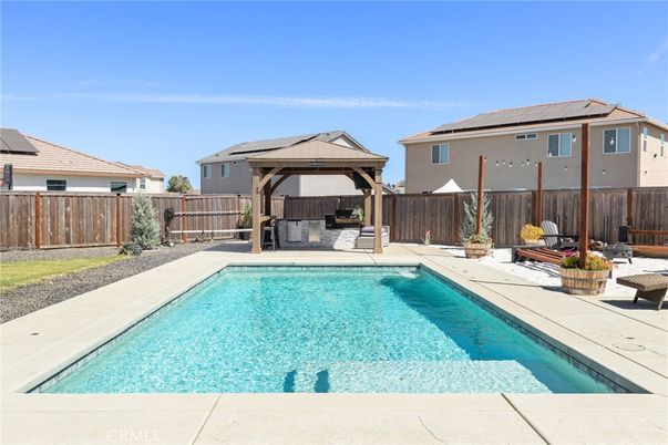 Exterior, Pool, Solar Panels