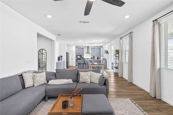 Dining room, Interior, Kitchen, Living room, Recessed Lighting, Stainless Steel Appliances, Wood Texture Flooring