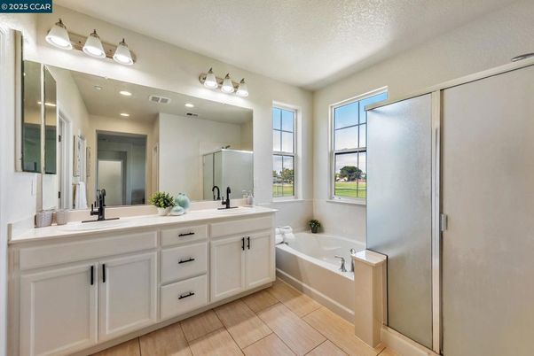 Bathroom, Dual Sink Vanities, Interior, Recessed Lighting, Wood Texture Flooring