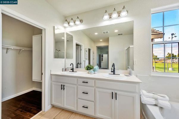Bathroom, Dual Sink Vanities, Interior, Recessed Lighting, Wood Texture Flooring