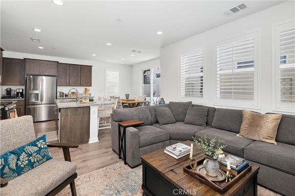 Dining room, Interior, Kitchen, Living room, Recessed Lighting, Stainless Steel Appliances, Wood Texture Flooring