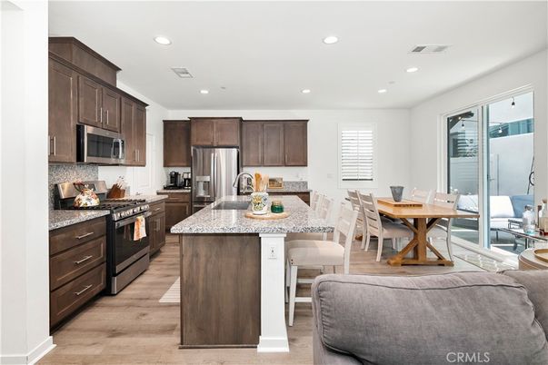 Dining room, Interior, Kitchen, Recessed Lighting, Stainless Steel Appliances, Wood Texture Flooring