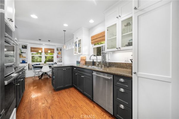Dining room, Interior, Kitchen, Pendant Lights, Recessed Lighting, Stainless Steel Appliances, Wood Texture Flooring