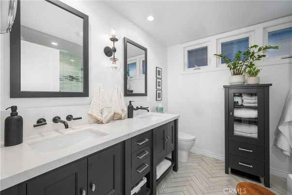 Bathroom, Dual Sink Vanities, Interior, Recessed Lighting, Wood Texture Flooring