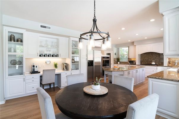 Dining room, Interior, Kitchen, Pendant Lights, Recessed Lighting, Stainless Steel Appliances, Wood Texture Flooring