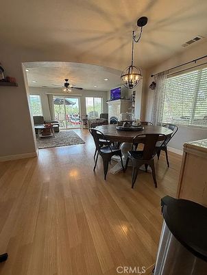 Chandelier, Dining room, Fireplace, Interior, Wood Texture Flooring