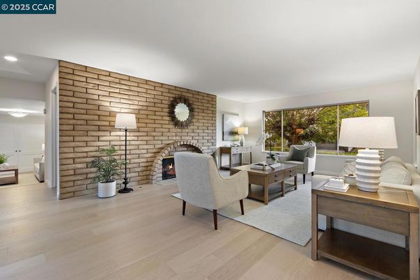 Fireplace, Interior, Living room, Recessed Lighting, Stone Walls, Wood Texture Flooring