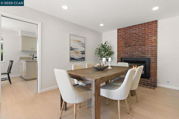 Dining room, Fireplace, Interior, Recessed Lighting, Stone Walls, Wood Texture Flooring