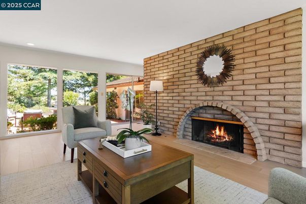 Fireplace, Interior, Living room, Recessed Lighting, Stone Walls, Wood Texture Flooring