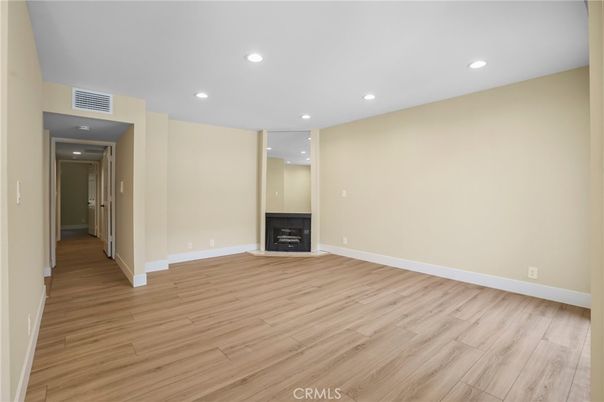 Empty room, Fireplace, Interior, Recessed Lighting, Wood Texture Flooring