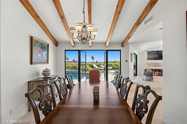 Chandelier, Dining room, Fireplace, Interior, Water, Wooden Beams