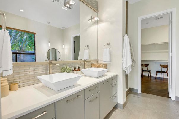 Bathroom, Dual Sink Vanities, Interior, Pendant Lights, Recessed Lighting, Wood Texture Flooring