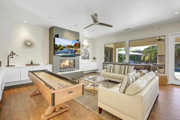 Fireplace, Game Room, Interior, Living room, Recessed Lighting, Wood Texture Flooring