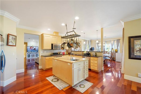 Dining room, Interior, Kitchen, Pendant Lights, Recessed Lighting, Stainless Steel Appliances, Wood Texture Flooring
