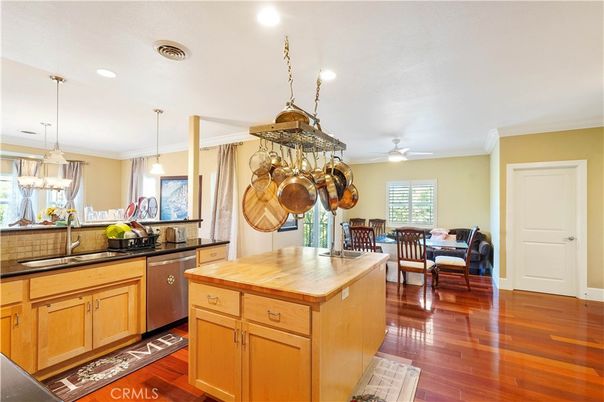 Dining room, Interior, Kitchen, Pendant Lights, Recessed Lighting, Stainless Steel Appliances, Wood Texture Flooring