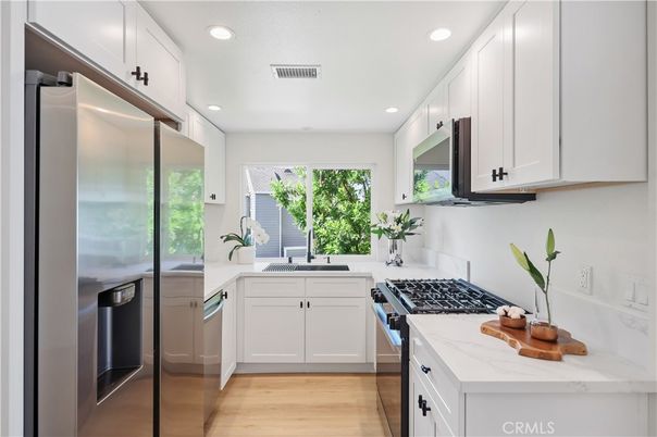 Interior, Kitchen, Recessed Lighting, Stainless Steel Appliances, Wood Texture Flooring