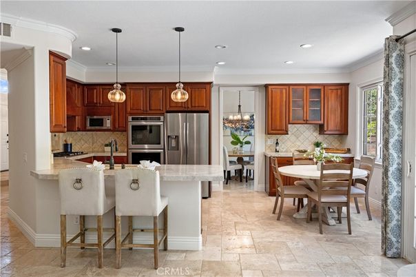 Chandelier, Dining room, Interior, Kitchen, Pendant Lights, Recessed Lighting, Stainless Steel Appliances