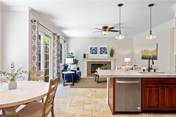 Dining room, Fireplace, Interior, Pendant Lights, Stainless Steel Appliances
