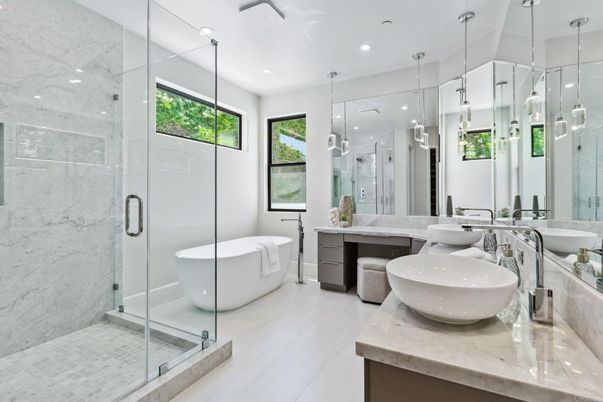 Bathroom, Dual Sink Vanities, Free Standing Baths, Glass Shower, Interior, Marble Walls, Pendant Lights, Recessed Lighting