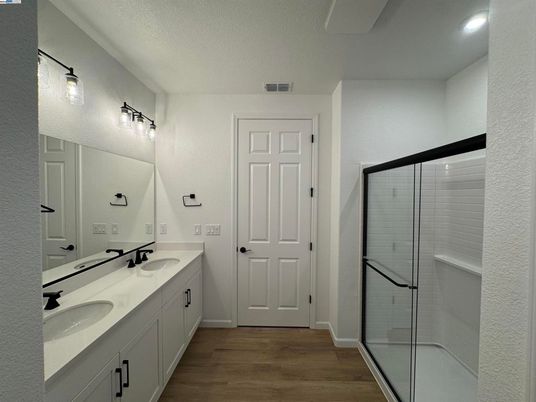 Bathroom, Dual Sink Vanities, Glass Shower, Interior, Wood Texture Flooring